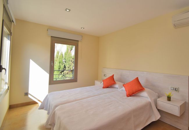 Dormitorio de la villa en Can Picafort Dormitorio de la villa en Can Picafort