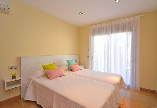 Dormitorio de la villa en Can Picafort Dormitorio de la villa en Can Picafort